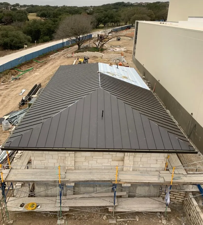 Metal roof new construction with scaffolding in Ulysses